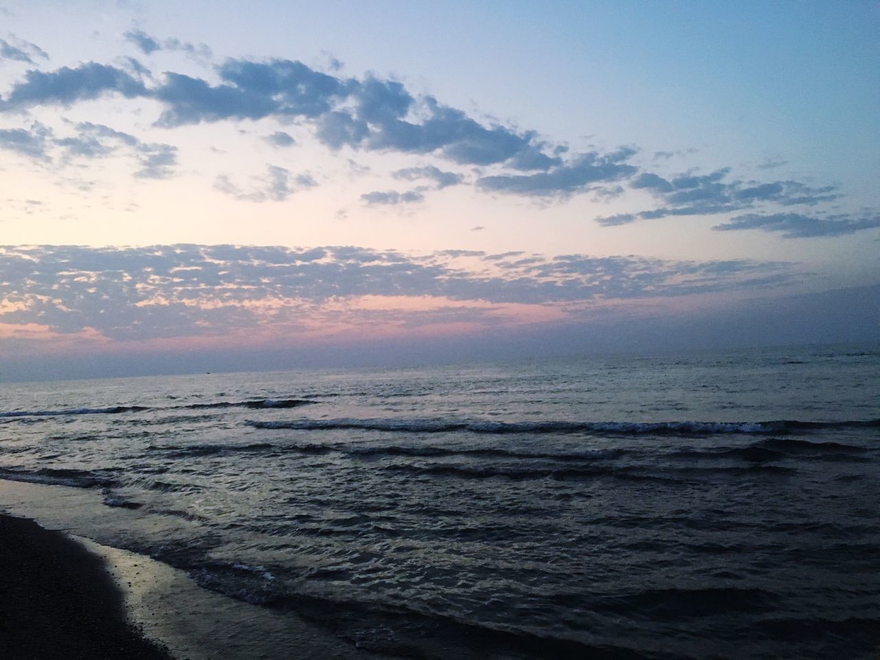 sea, horizon over water, water, scenics, tranquil scene, tranquility, sunset, beauty in nature, beach, sky, idyllic, nature, shore, calm, wave, seascape, majestic, cloud - sky, cloud, non-urban scene, outdoors, remote, no people, ocean, coastline