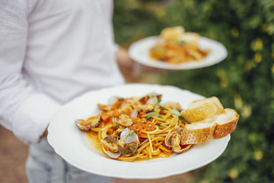 Midsection of man having food