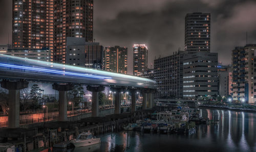 Illuminated buildings in city at night