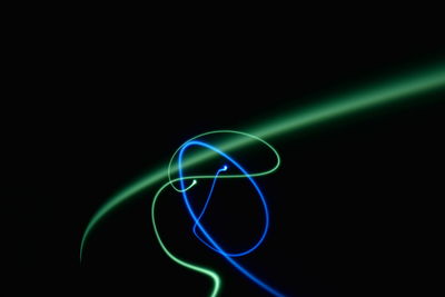 Light painting against black background