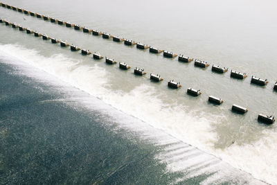 High angle view of dam in sea