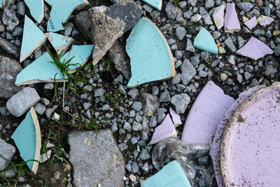 High angle view of stones on snow field