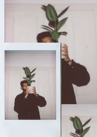 Woman standing by potted plant