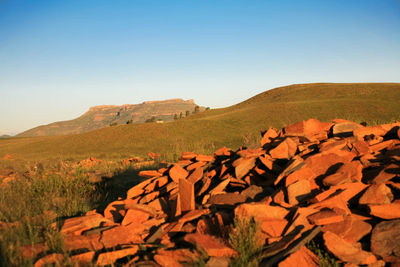 Scenic view of rocky mountains against clear blue sky