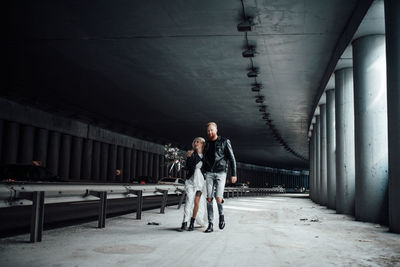 People walking on bridge