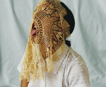 Close-up of man wearing hat