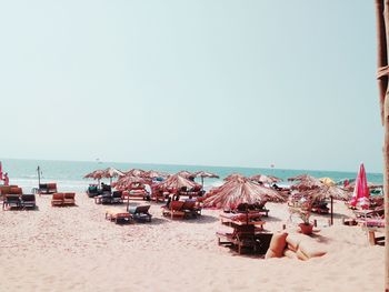 Panoramic view of beach against clear sky