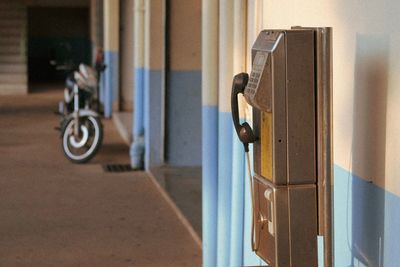 Bicycle by door of building