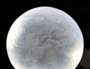 Close-up of black light against black background