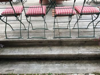 Low section of man sitting on bench