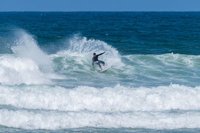 Man surfing in sea