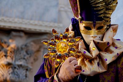 Close-up of hand holding umbrella