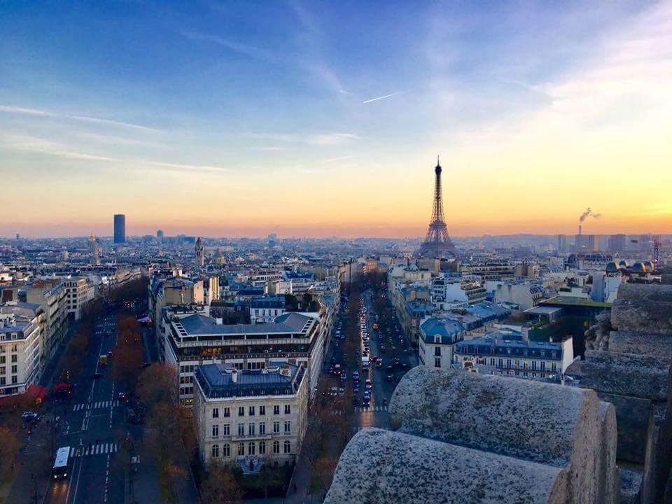 HIGH ANGLE VIEW OF CITY AT SUNSET