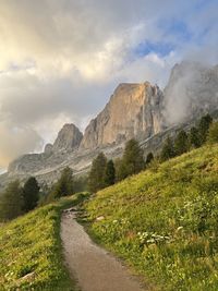 Scenic view of landscape and mountains against sky