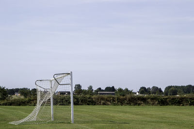 Scenic view of soccer field against sky