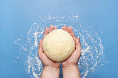 Midsection of person holding ice cream