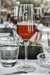 Close-up of beer in glass on table at restaurant