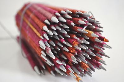 Close-up of colored pencils on table