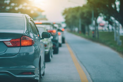 Cars on road against sky