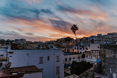 High angle view of townscape against sky at sunset