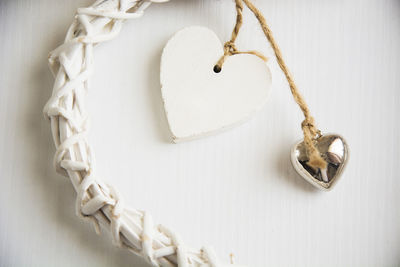 Close-up of heart shape hanging on wall