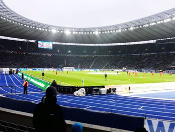 Group of people on soccer field