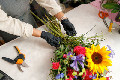 High angle view of woman holding bouquet
