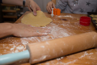 Close-up of cropped hand holding food