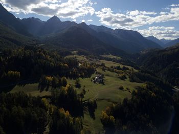 Scenic view of landscape and mountains against sky