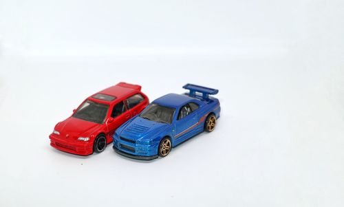 Close-up of toy car against white background
