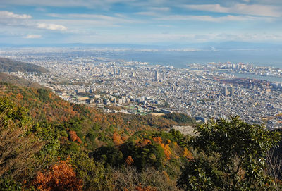 Aerial view of cityscape against sky