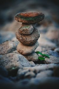 Close-up of stone stack on rock