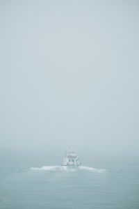 A ship on a foggy sea