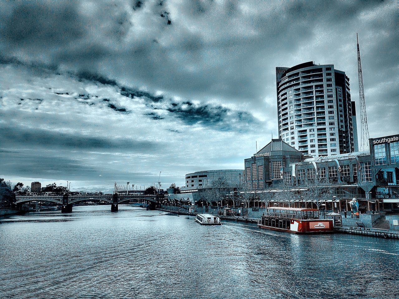 building exterior, sky, architecture, cloud - sky, built structure, water, cloudy, city, weather, transportation, mode of transport, waterfront, overcast, nautical vessel, cloud, sea, building, dusk, storm cloud, wet