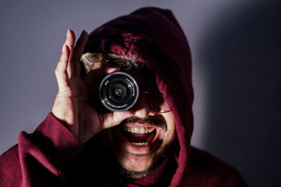 Portrait of man photographing