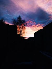 Silhouette of building at sunset