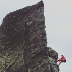 Low angle view of man climbing