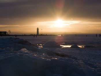 Scenic view of sea at sunset