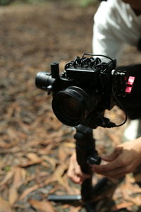 Close-up of camera photographing