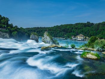 Scenic view of river against sky