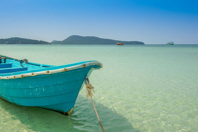 Scenic view of sea against clear blue sky