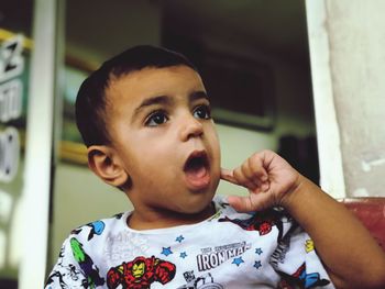 Portrait of cute boy looking away