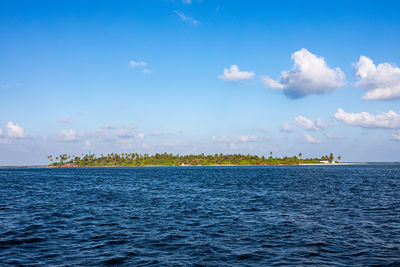 Tropical island seen from the ocean