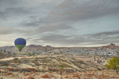 View of hot air balloon against cloudy sky