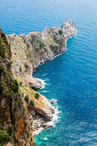 High angle view of rock formation in sea