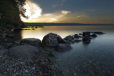 Scenic view of sea against sky during sunset