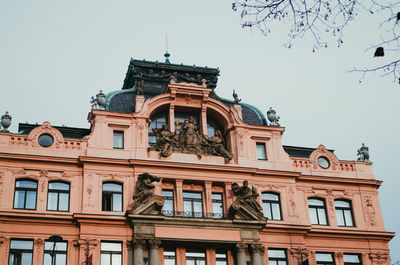 Low angle view of historic building against clear sky