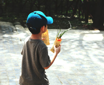 Full length of boy playing