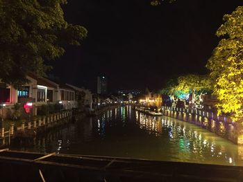 View of illuminated street lights at night