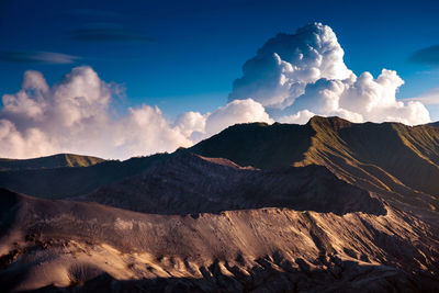 View of mountain range against cloudy sky